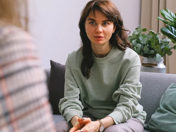 Woman sitting in counselling.
